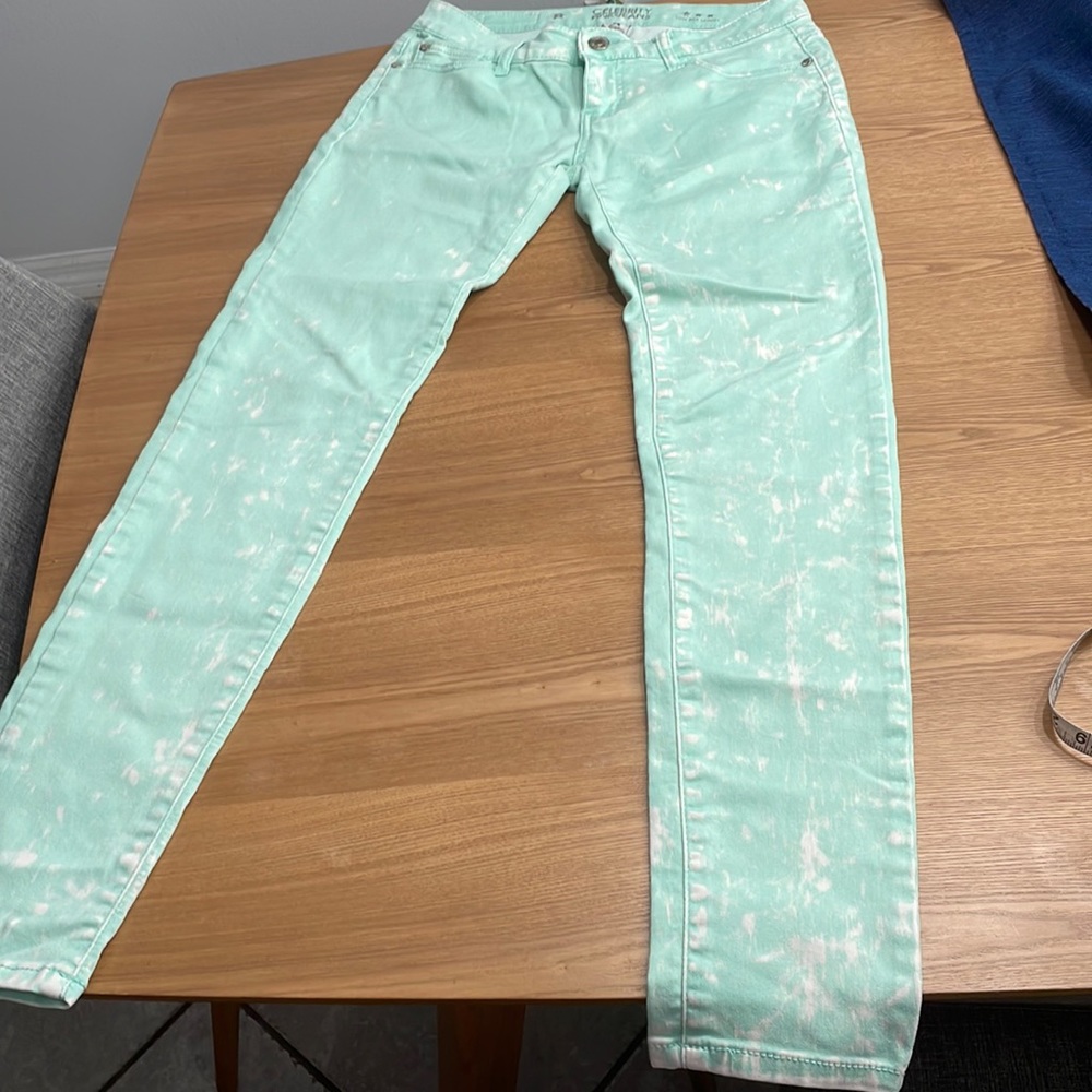 Celebrity Pink low rise skinny mint color jeans, with white splashes, size 5.